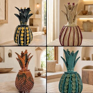 May include: Four decorative pineapple-shaped ceramic jars with lids. One is black with yellow accents, one is cream with red vertical lines, one is brown with a textured surface, and one is teal with green circular patterns on the body.