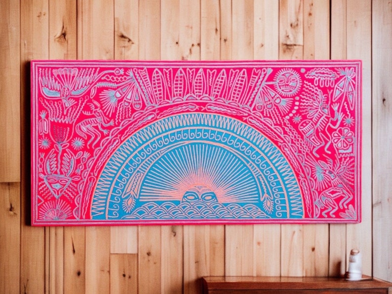May include: A colorful, hand-drawn artwork on a pink background with a blue and white sun in the center. The artwork features a variety of geometric shapes and patterns, including circles, squares, and triangles. The sun is surrounded by a ring of white dots and a ring of blue waves.