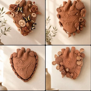May include: A collection of four wall-mounted terracotta heart sculptures. Each piece features intricate relief carvings of branching veins and is adorned with various three-dimensional clay flowers, leaves, and butterflies in natural earth tones.