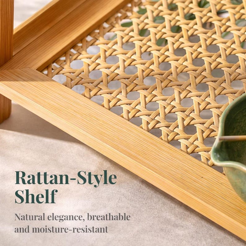 May include: A light brown rattan-style shelf with a woven design. The shelf has a rectangular frame and a woven centre. The text "Rattan-Style Shelf" is displayed on the image, along with the words "Natural elegance, breathable and moisture-resistant."