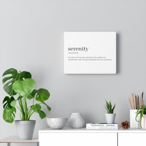 May include: A white canvas print with the word "serenity" and its definition: "the state of being calm, peaceful, untroubled, and unbothered, never being troubled by life's ups and downs".