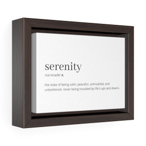 May include: A framed canvas print with the word "serenity" in black text and its definition in smaller black text. The definition is "the state of being calm, peaceful, untroubled, and unbothered, never being troubled by life's ups and downs."