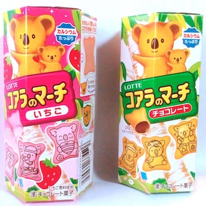 May include: Two boxes of Lotte Koala's March biscuits. One box is pink with strawberry flavor, the other is green with chocolate flavor. Each box features a koala bear design and Japanese text.
