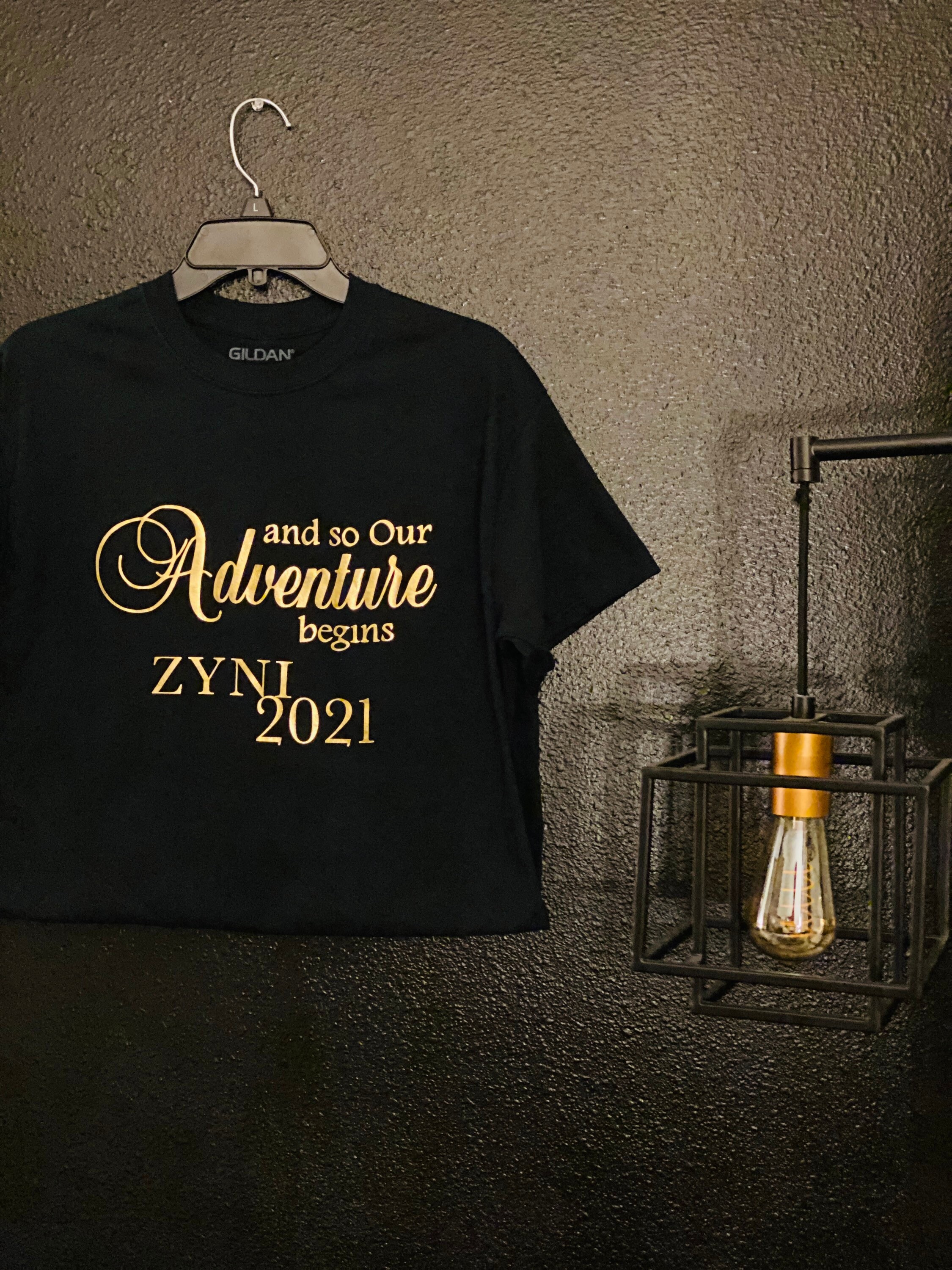 T shirt hotsell with gold writing