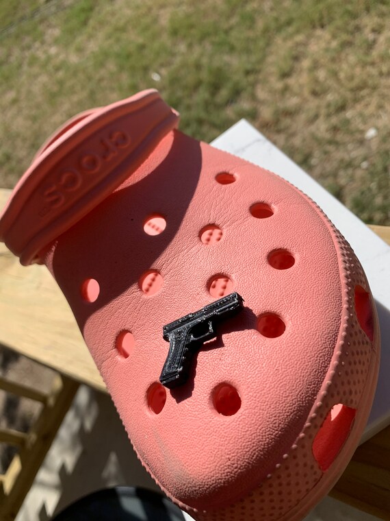 gun croc charms