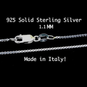 May include: A silver chain necklace made in Italy. The chain is 925 solid sterling silver and 1.1 mm wide.