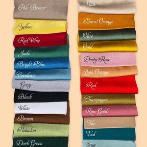 May include: A color chart of silk fabric swatches in various colors, including pale brown, yellow, red wine, jade, bright blue, cerulean, gray, black, white, brown, pistachio, dark green, wheat, burgundy, nude, burnt orange, olive, gold, dusty rose, light orange, red, champagne, rose gold, tan, teal, sage, tea rose, and ivory.