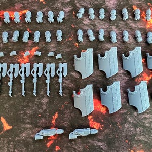 Axe Breacher conversion set. Designed to fit MK 3 armour in the Age of Darkness