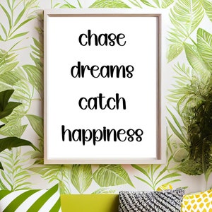 May include: A framed print with the words "Chase dreams catch happiness" in black script hangs above a lime green sofa with decorative pillows. The pillows have green and white stripes, a black and white pattern, and a yellow and white pattern.