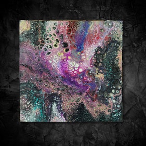 May include: Abstract painting with a swirling pattern of pink, purple, blue, and black paint. The paint has a textured, bubbly appearance.