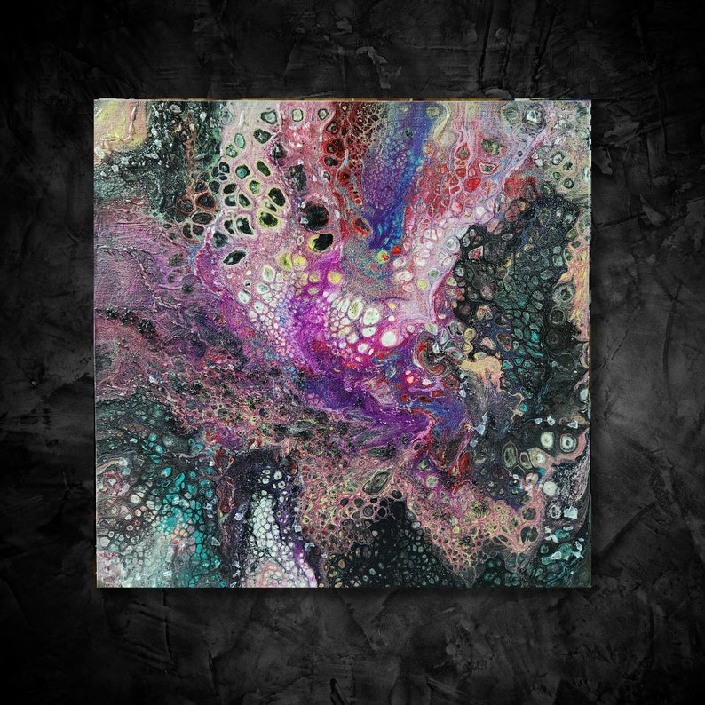 May include: Abstract painting with a swirling pattern of pink, purple, blue, and black paint. The paint has a textured, bubbly appearance.