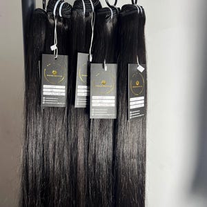100% 人間の生毛ウェフトエクステンション - ナチュラルブラック 1B、ストレート、ダブルドロー、ベトナム産