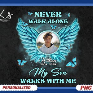 May include: A personalized memorial design featuring a young man's photo, framed by blue angel wings and butterflies. The text says "Never Walk Alone" and "My Son Walks With Me." Includes the name "William" and dates 2004-2025.