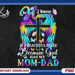 May include: A colorful graphic design with a cross and wings. The text reads "I know heaven is a beautiful place because God has my Mom-Dad".