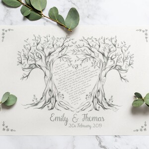 May include: A pencil-drawn wedding art print featuring two trees with intertwined branches forming a heart shape. The print includes a poem, names "Emily & Thomas", and the date "20th February 2019". Decorative floral accents are in the corners.