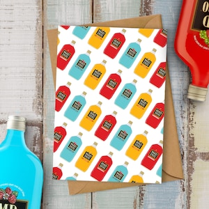 May include: A white card with a repeating pattern of colorful bottles with the text "Mad Dug" on each bottle. The bottles are red, yellow, and blue.