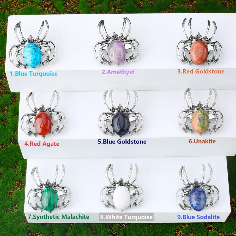 Handcrafted natural crystal spider featuring a polished gemstone body set in a finely crafted alloy spider frame. designed with natural stones creating a luxurious and artistic jewelry piece. The smooth gemstone surface and detailed spider legs give it a striking and elegant appearance. Perfect as a pendant necklace or brooch accessory symbolizing creativity, protection, and good fortune. Ideal for meditation energy healing, spiritual balance, fashion styling, gift giving, and decorative display