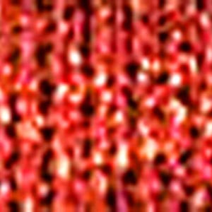May include: A close-up shot of a textured, red surface. The surface appears to be made up of many small, closely packed elements, creating a dense, vibrant pattern. The color palette is dominated by shades of red.