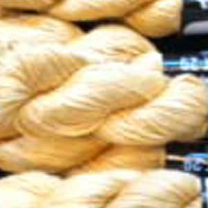 May include: Close-up of several skeins of pale yellow yarn, tightly twisted and stacked. The yarn appears soft and fluffy, with a slight sheen. The image highlights the texture and color of the yarn, suitable for knitting or crochet projects.