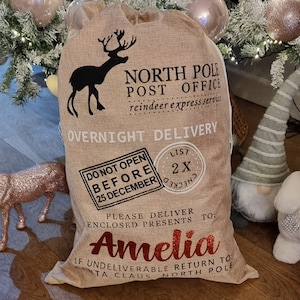 Luxury Personalised Christmas Santa Sack, Custom Jute North Pole Post Office Mail Christmas Gift Bag, Large Personalised Holiday Gift Sack