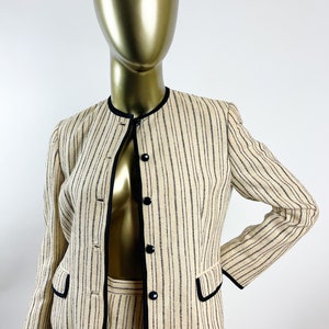 1970’s cream and black striped skirt suit by Roth le Cover Sport . Casually elegant, tailored style jacket and classic skirt.
