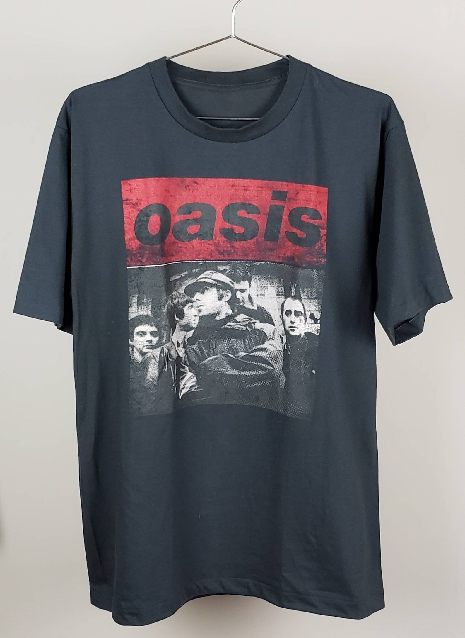 oasis black shirt