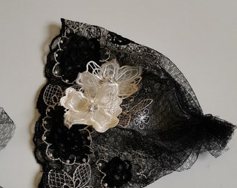 lace baby hat with beige flowers