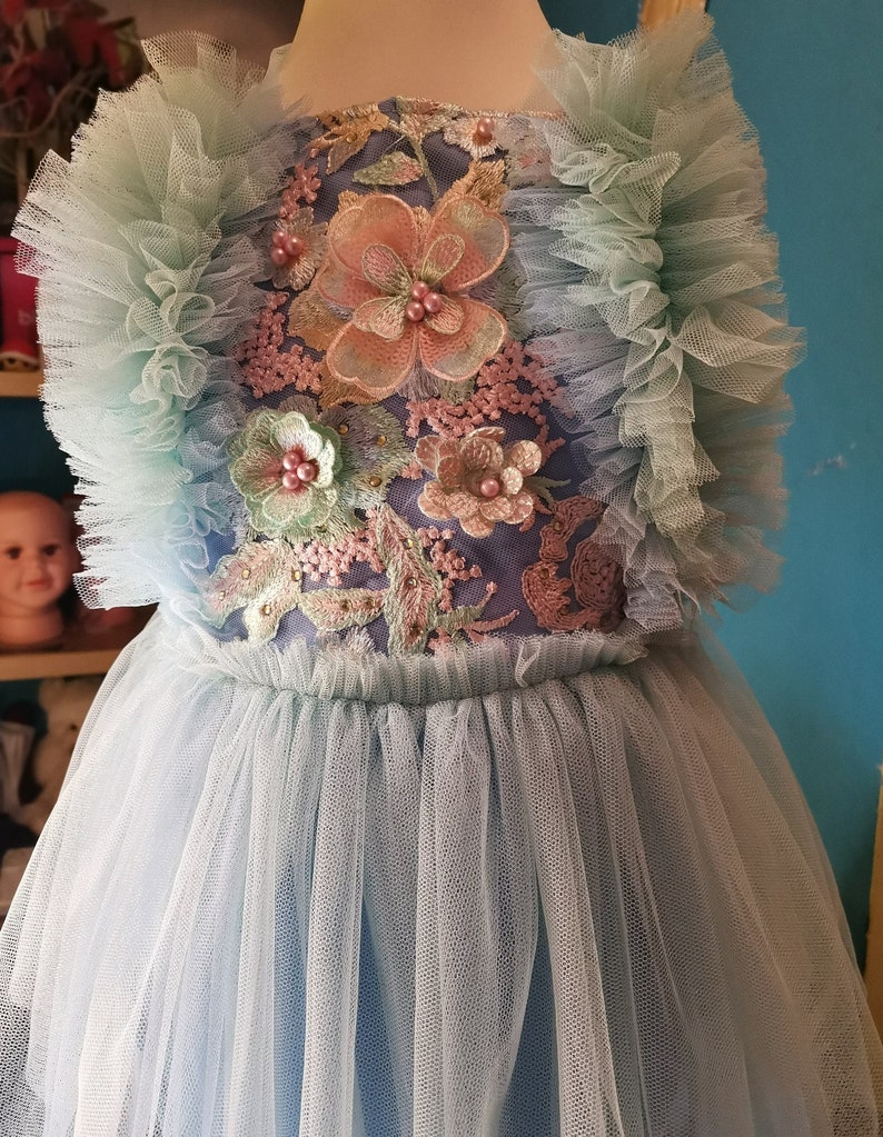 beautiful romper in aquamarine-blue color