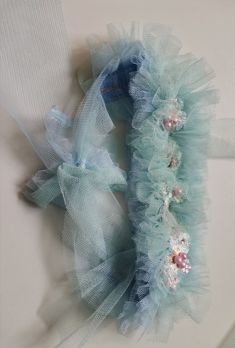 beautiful romper in aquamarine-blue color