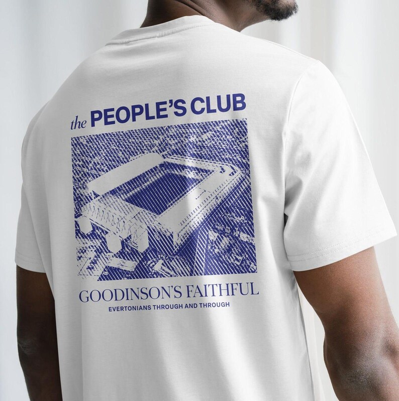 May include: White t-shirt with a blue graphic of a stadium and text that reads "the PEOPLE'S CLUB" and "GOODISON'S FAITHFUL". The text "EVERTONIANS THROUGH AND THROUGH" is also included.