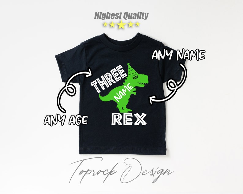 May include: Black t-shirt with a green dinosaur wearing a party hat. The dinosaur says "Three Name Rex" on it. The text "Any Name" is written above the dinosaur and "Any Age" is written below the dinosaur.