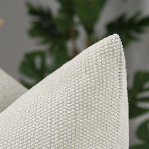 Housse de coussin texturée beige crème : taie d&#39;oreiller neutre, coussin douillet