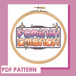 May include: Cross stitch pattern for a hoop with the text "Feminine AF" in a retro pixelated style with rainbow colors and sparkling stars.