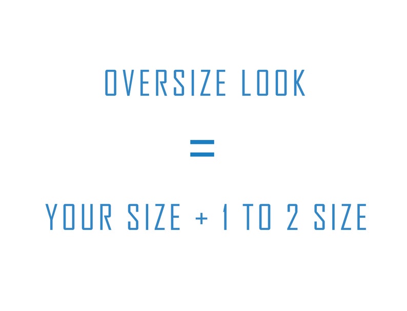 May include: White background with blue text that reads "OVERSIZE LOOK = YOUR SIZE + 1 TO 2 SIZE". The text is in a sans-serif font. The word "OVERSIZE" is at the top, followed by an equals sign, and then the rest of the text.