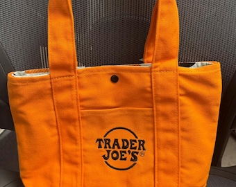 Mini torba Trader Joe's Halloween 2026 – pomarańczowa z podszewką i guzikiem