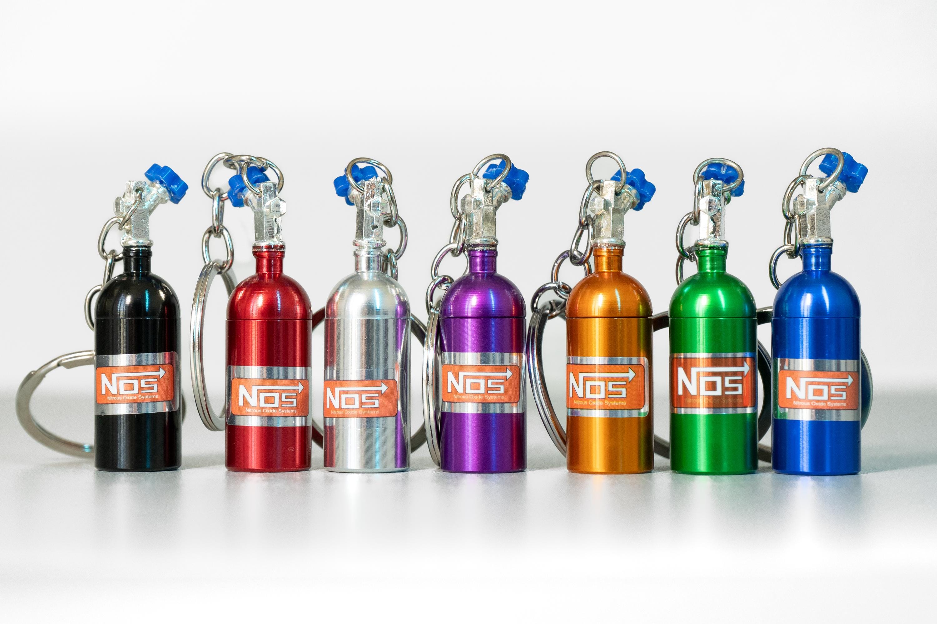 NOS Bottle Keychain Set (2): Automotive Keyring for Car Lovers