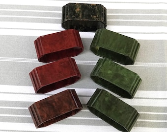 7 anelli portatovaglioli in bachelite marmorizzata, porta tovaglioli in stile Art Déco