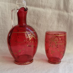 Antique cranberry glass decanter & matching glass/Gilded enameled glass decanter with water glass/Pink and gold cordial glass and decanter
