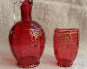 Antique cranberry glass decanter & matching glass/Gilded enameled glass decanter with water glass/Pink and gold cordial glass and decanter