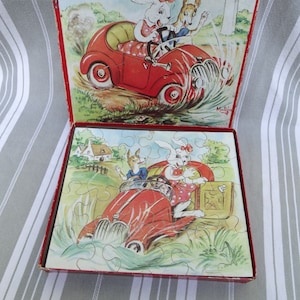3 pudełka z puzzlami/Zabytkowe puzzle z lat 50./Puzzle Didine la Lapine/Francuska artystka Marie-Thérèse Jallon/Gry kolekcjonerskie