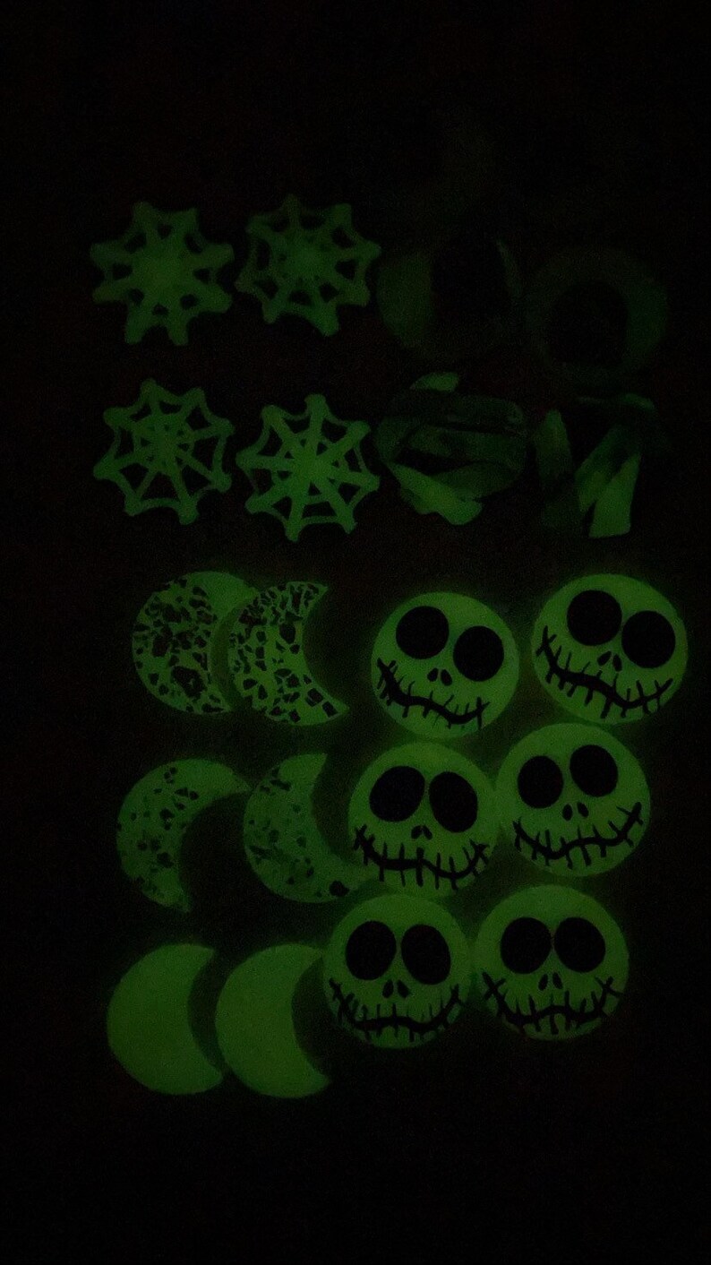 Glow in the dark crescent moon studs