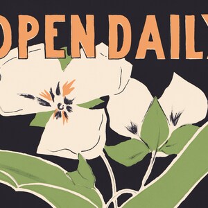 May include: A vintage poster with the text "OPEN DAILY" in orange letters on a black background. The poster features a stylized illustration of white flowers with green leaves.