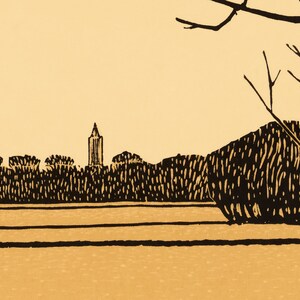 May include: A black and white illustration of a cityscape with a tall building in the centre. The cityscape is surrounded by trees and a field of grass. The sky is a light yellow colour.