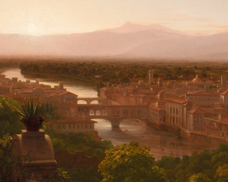May include: A painting depicting a cityscape with a river flowing through it. The city is built on a hill with a mountain in the background. The sky is a soft pink and orange color, suggesting a sunset. The river is a light blue color and reflects the sky. The city is made up of many buildings, some of which are tall and narrow, while others are short and wide. There are trees and other vegetation scattered throughout the city.