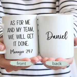 May include: White ceramic mug with black text that reads "As for me and my team, we will get it done. Manager 24:7" on the front and the name "Daniel" on the back.