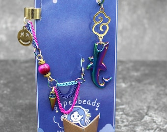 Pendientes inspirados en la chica con trenza de la Bomba del Caos