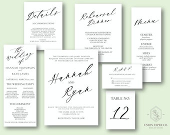 May include: Wedding invitation suite with black calligraphy text on white cardstock. The cards include details about the wedding ceremony, reception, rehearsal dinner, and RSVP information. The cards are decorated with floral accents.