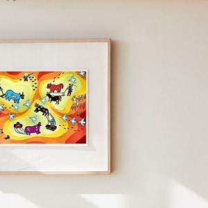 May include: A living room featuring a sofa, a side table, and a framed picture depicting a colourful illustration of cows and birds. The side table has a gold vase, a green planter, a pumpkin, and a small metal rocket ship. There are also books and a blue storage bin on the table.