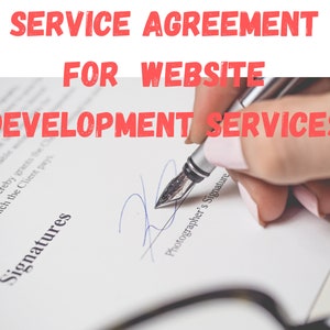 May include: A document titled "SERVICE AGREEMENT FOR WEBSITE DEVELOPMENT SERVICES" is being signed with a silver fountain pen. The document includes the word "Signatures" and "Photographer's Signature".
