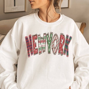 Pull de noel new yorker sale